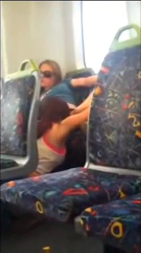 Lesbian cunnilingus on the train